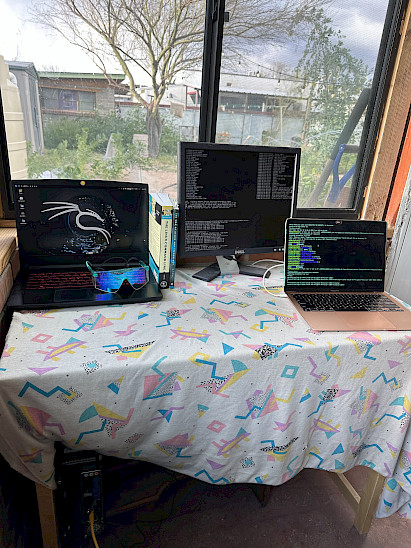 The station where I worked on the Dell server (under the desk) feat. the dorky blue light glasses kindly lent to me by a friend that saved me when I had a week long eye twich from staring at the three screens at a time